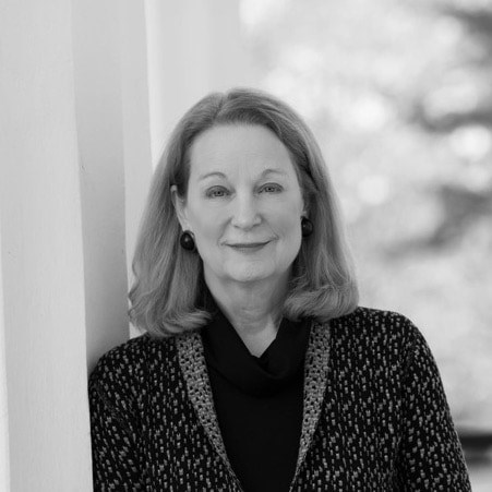 black and white image of Susan Eisenhower looking at the camera