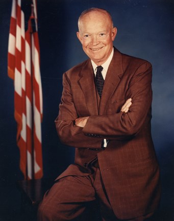 A color image of President Dwight D. Eisenhower wearing a dark brown suit