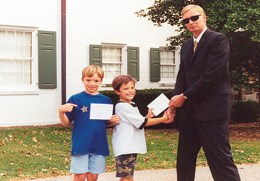 Junior Secret Service agents receiving certificates. Junior Secret Service agents receiving certificates.
