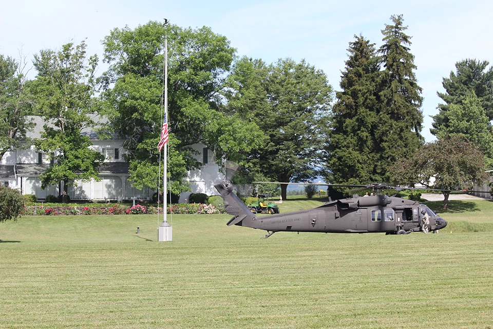 Blackhawk helicopter at Eisenhower A black hawk helicopter sits in the fields behind the Eisenhower home.