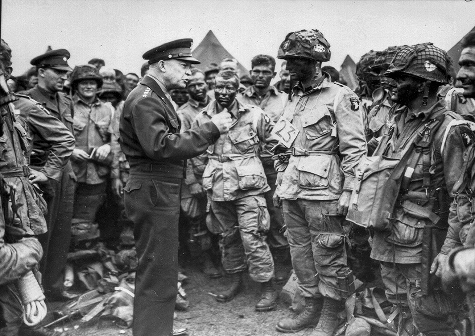 General Eisenhower talks to his troops on the eve of the D-Day invasion. General Eisenhower talks to his troops on the eve of the D-Day invasion.