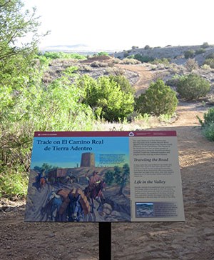 Exhibit has artwork depicting El Camino Real with mules carry goods Exhibit has artwork depicting El Camino Real with mules carry goods