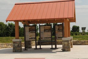 Outdoor exhibit kiosk with wayside exhibits Outdoor exhibit kiosk with wayside exhibits