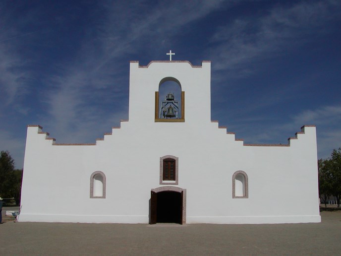 1800's adobe mission, white colored, blue sky in background 1800's adobe mission, white colored, blue sky in background