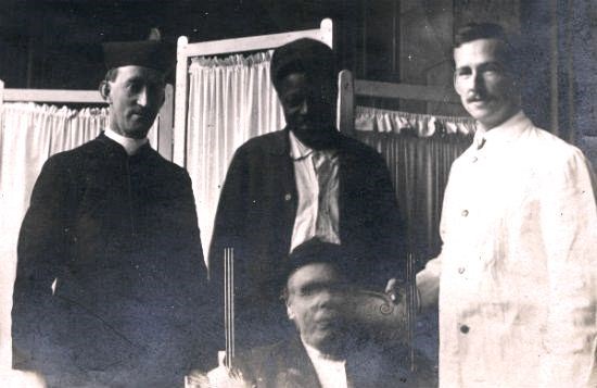 Doctor, 2 Patients and a priest c1920