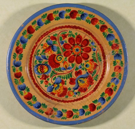 Multi-colored hand-painted wooden plate from Czechoslovakia c. 1923