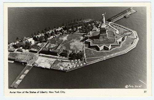 Postcard with aerial view of Liberty Island and Fort Wood c. 1930s
