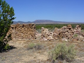 A homestead sits next to a lava flow A homestead sits next to a lava flow