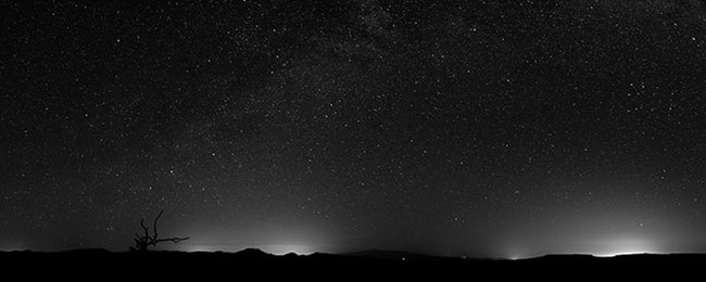 Night sky with visible areas of light pollution