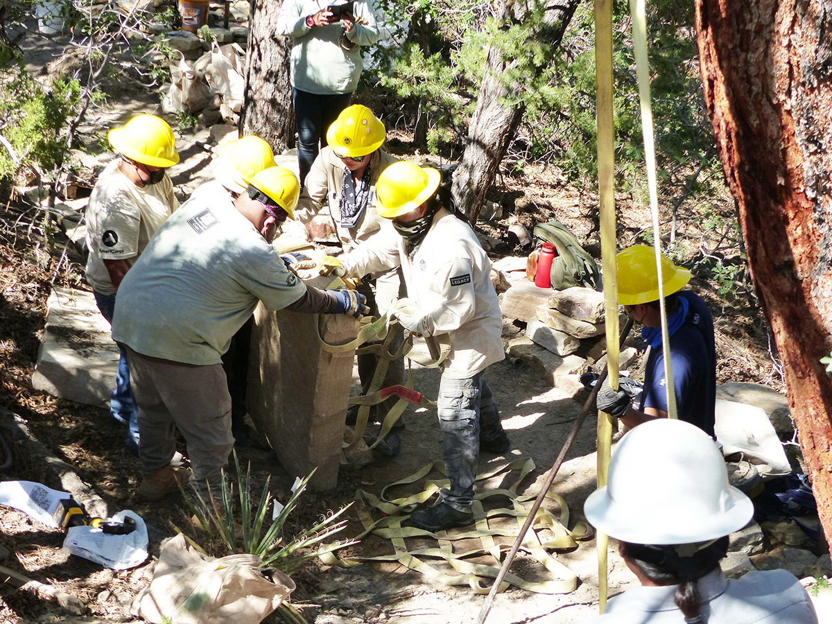 ALCC youth crew moving large stone slab ALCC youth crew moving large stone slab