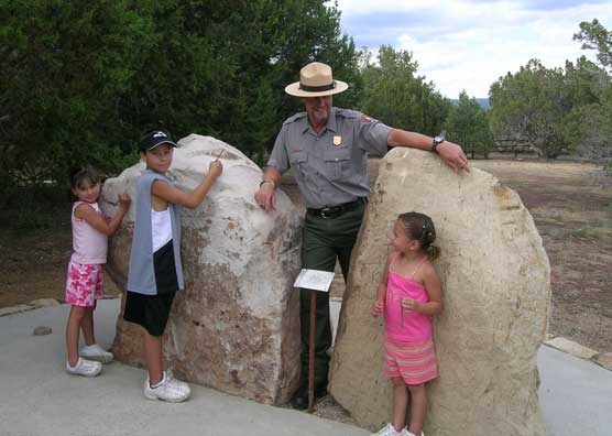 Image of a park ranger and kids Image of a park ranger and kids