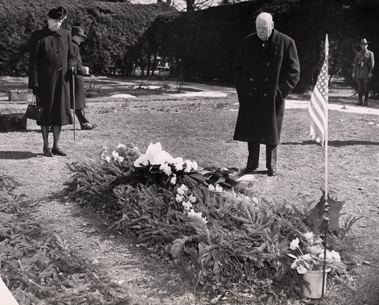 Churchill and Eleanor Roosevelt at FDR's Grave A man and a woman stand at a gravesite