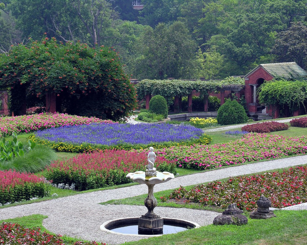 Vanderbilt Formal Gardens Red, pink, and purple flowers in a terraced garden.