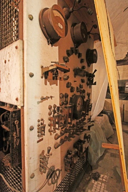 The main electrical control panel A wall with switches and dials