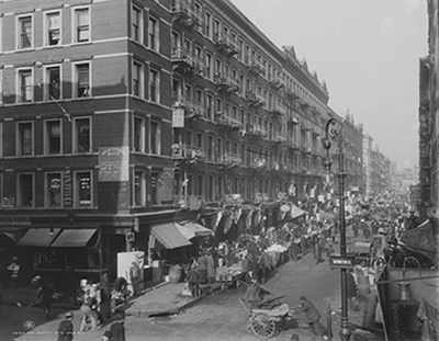 A busy street surrounded by tall buildings