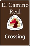 El Camino Real de los Tejas logo with a brown background, red-shaded missions, a winding trail, and a silhouette of a person.