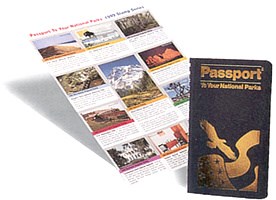 Passport program book and stamps on white background