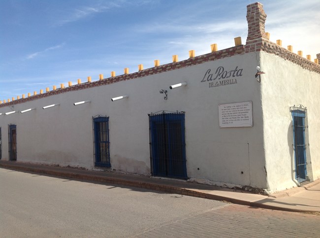 old spanish style white house