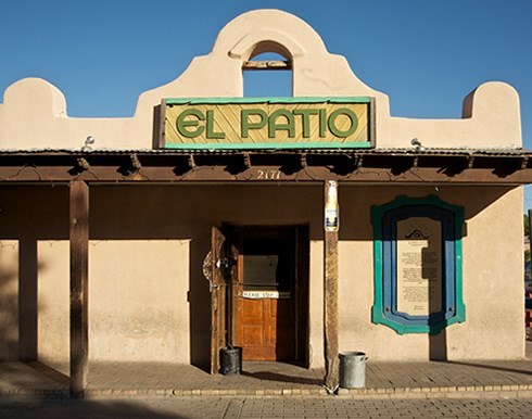 image of an spanish colonial style home turned restaurant called "el patio"