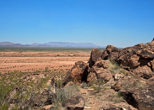 rocks and a mountain in the back