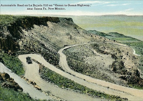 old postal card of La Bajada Mesa with a road and a mountain