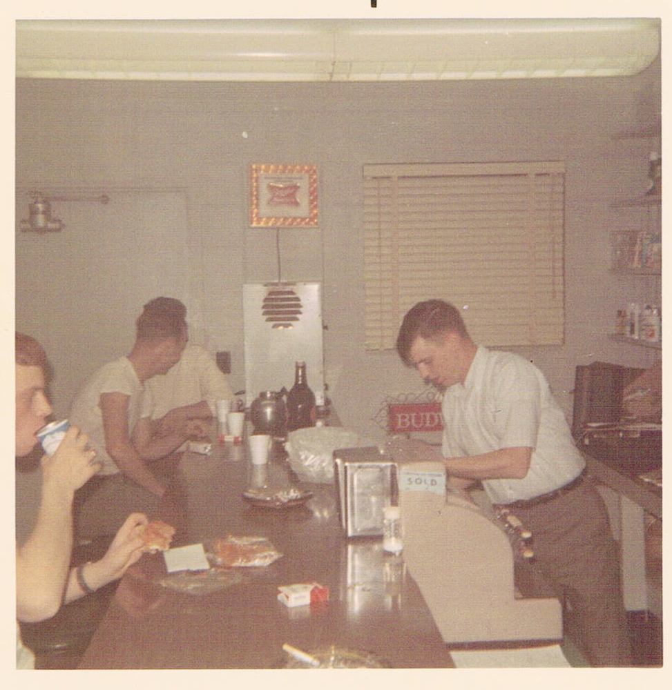 A Btry PX Chris Doyle waits on Bob Steinmetz et al