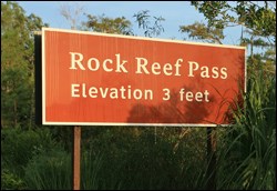 Rock Reef Pass sign along the main park road