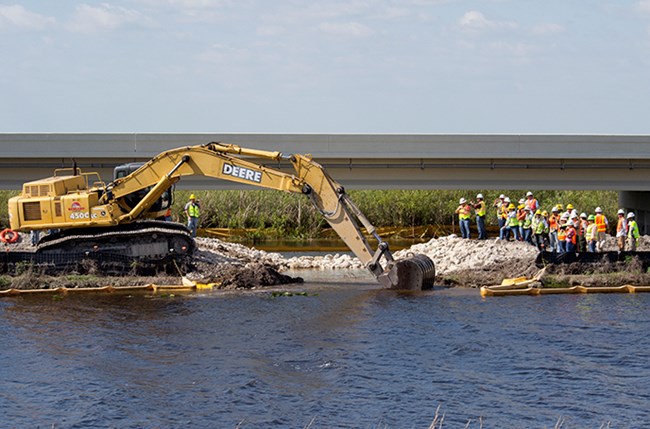 The old Tamiami Trail roadway was broken through