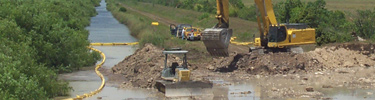 Heavy Equipment Working on the L67 Canal