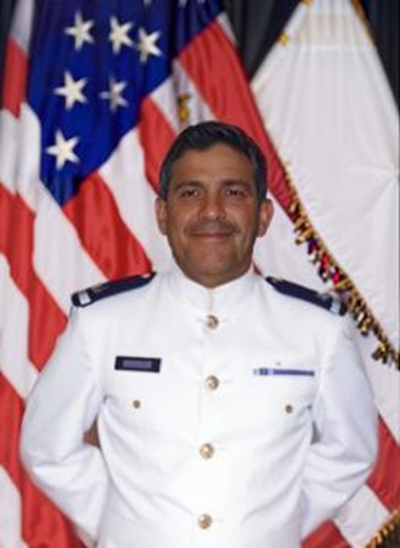 Dr. Anthony Atwood posing in a military uniform.