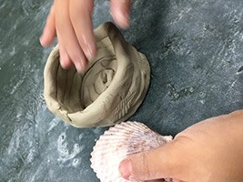 Making pottery out of clay