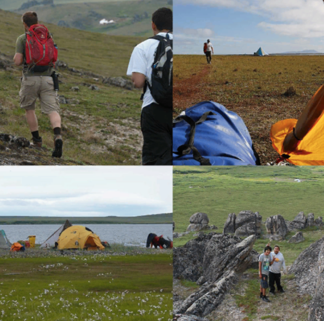 Two young boys hike among granite spires.
 Three tents are set up near a lagoon on a grassy meadow. Looking through the tent vestibule, a young hiker approaches the tent. From behind, two young boys hike in a vast green landscape.