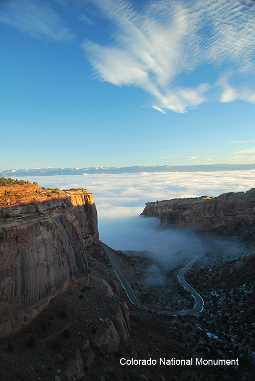 Example of Clouds & Vapor - Image of fog moving between two mountains