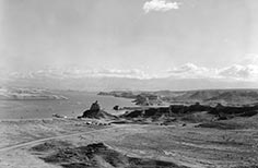 View of mountains and lake in the distance.