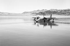 U.S. Air Force airplane floating on a lake.