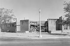 Construction site with partially built building.