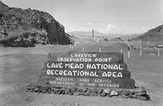 Lake Mead sign along the side of road.