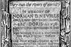 Memorial plaque with words in honor of Norman D. Nevills and his wife Doris.


