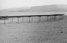 Construction of shaded structure on a beach.