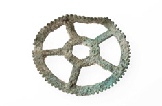 Aged wheel with sediment buildup on it.