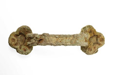 Side view of aged handle with sediment build up on it.