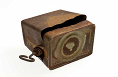Metal container with lid and opener.