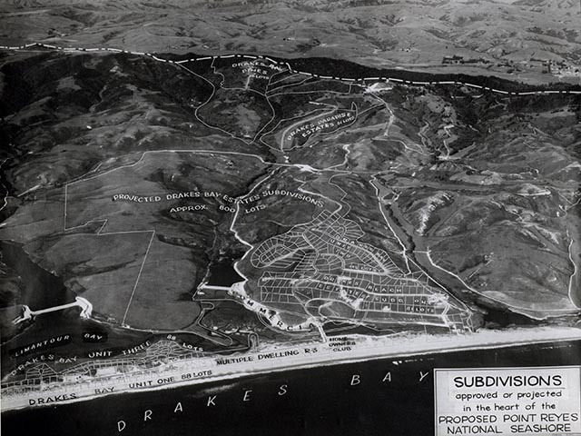 A semi-aerial photo of the land around Drakes Bay and Beach with housing developments drawn in on top of the hills.