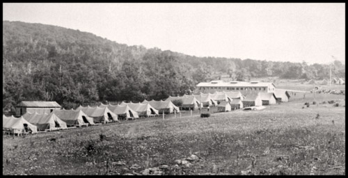 View of the Skyland campsite with 11 tents and 5 buildings.