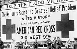 A large banner reading: Help The Flood Victims.