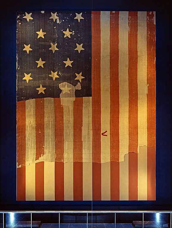 A 15-star, 13-stripe American Flag.