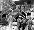 Reporters standing outside the cabin at Rapidan Camp.