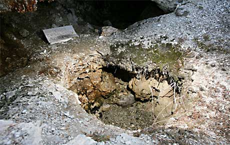 A small cave like this one in the Mammoth area may contain carbon dioxide