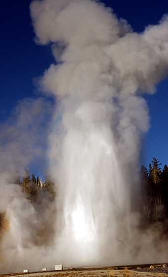 Grand geyser shoots out a huge plume of water and steam