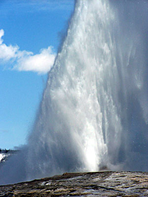 Old Faithful Geyser in full eruption